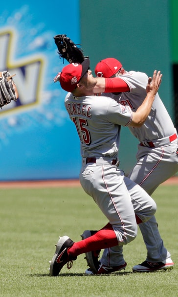 Reds open game with 2 homers, beat Indians 7-2, split series